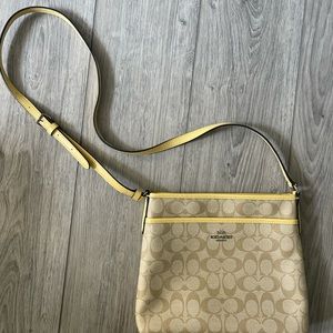 Coach Signature File Crossbody tan with yellow trim